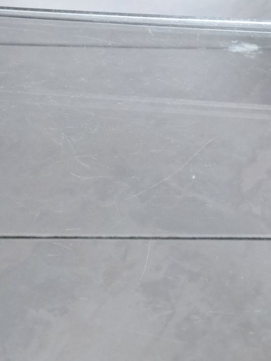 Vintage Mimi pull-out tables set in plexiglass