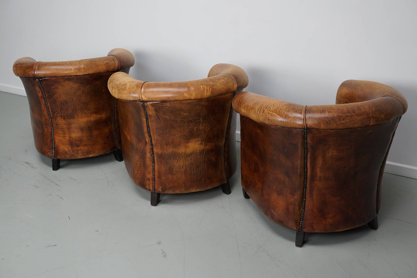 Fauteuils club vintage hollandais en cuir cognac, lot de trois