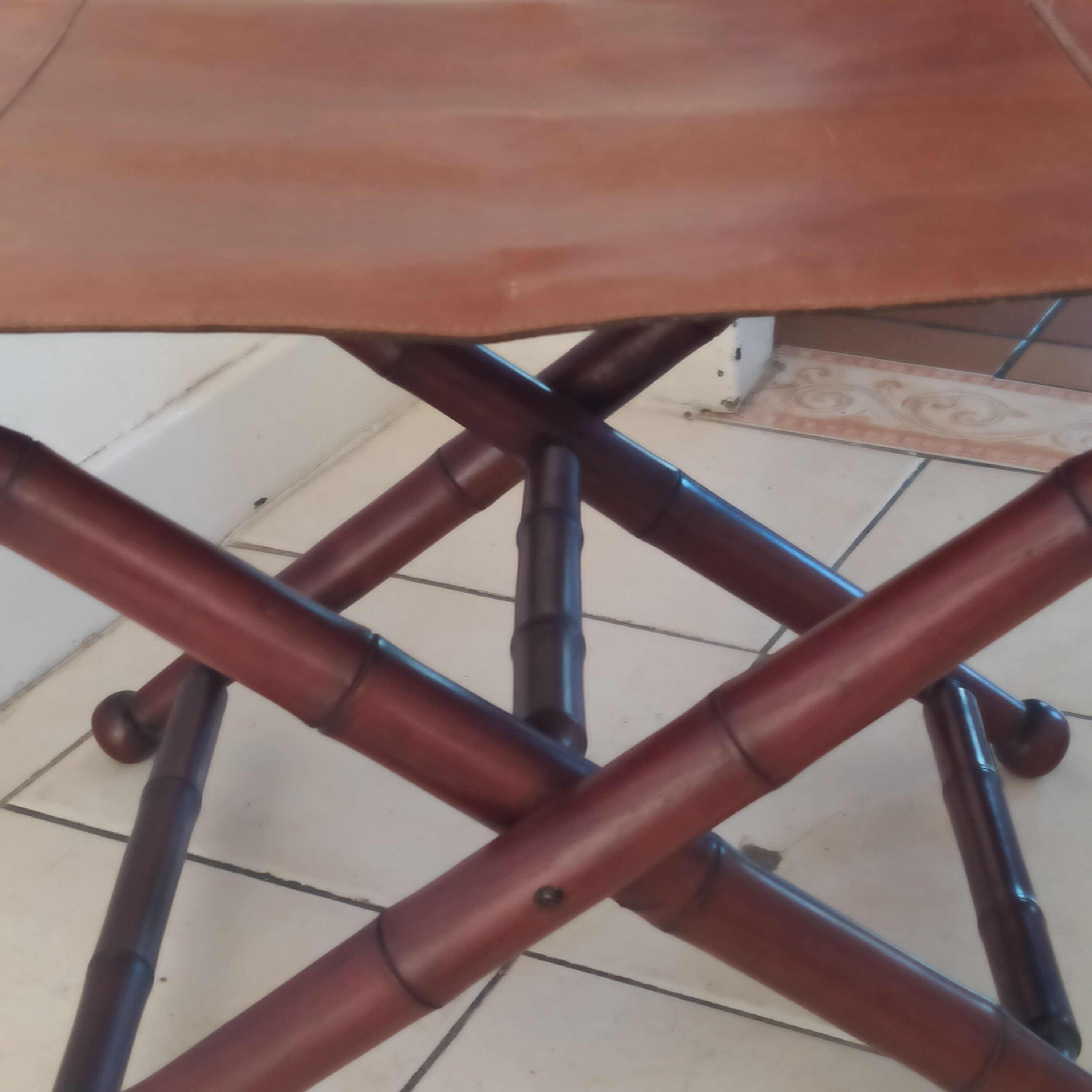 Vintage foldable leather and mahogany stool