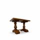 A small, rustic walnut wooden table, crafted from solid walnut wood, 1