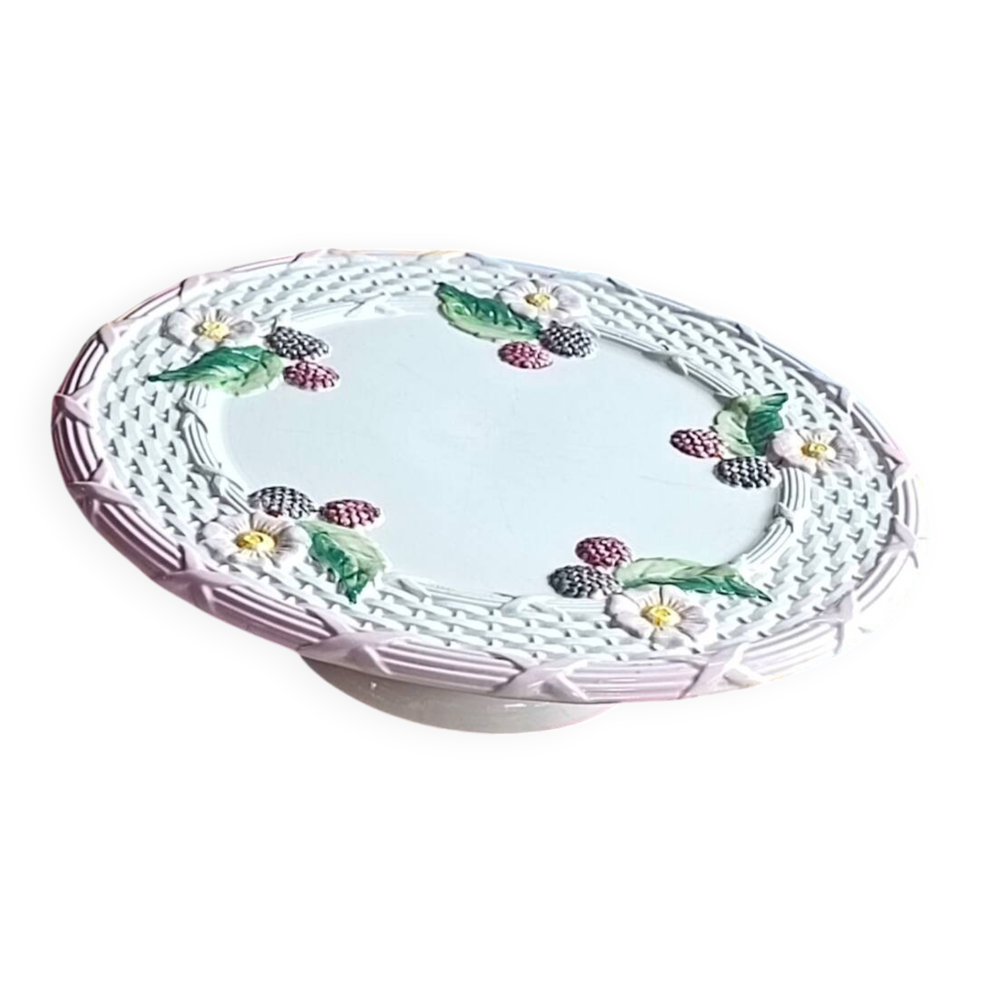 Footed dessert plate in barbotine porcelain, marked FG.