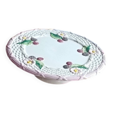 Footed dessert plate in barbotine porcelain, marked FG.