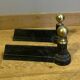 Pair of Napoleon III andirons from the 19th century in cast iron and brass