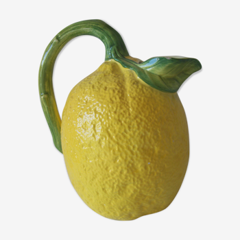 Vintage pitcher has form of lemon