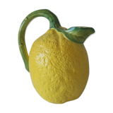 Vintage pitcher has form of lemon