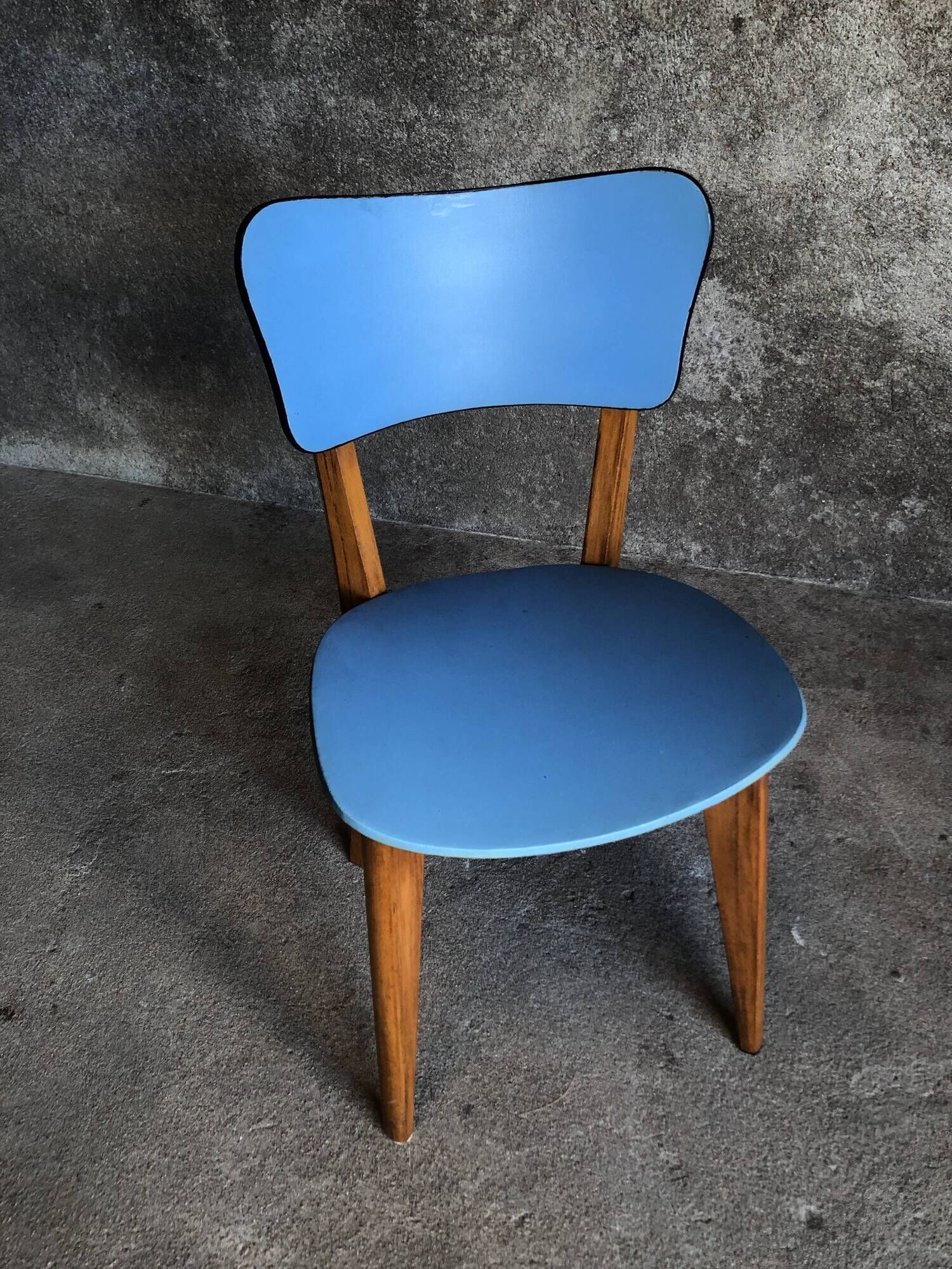 Pair of vintage bistro chairs in wood and light blue vinyl
