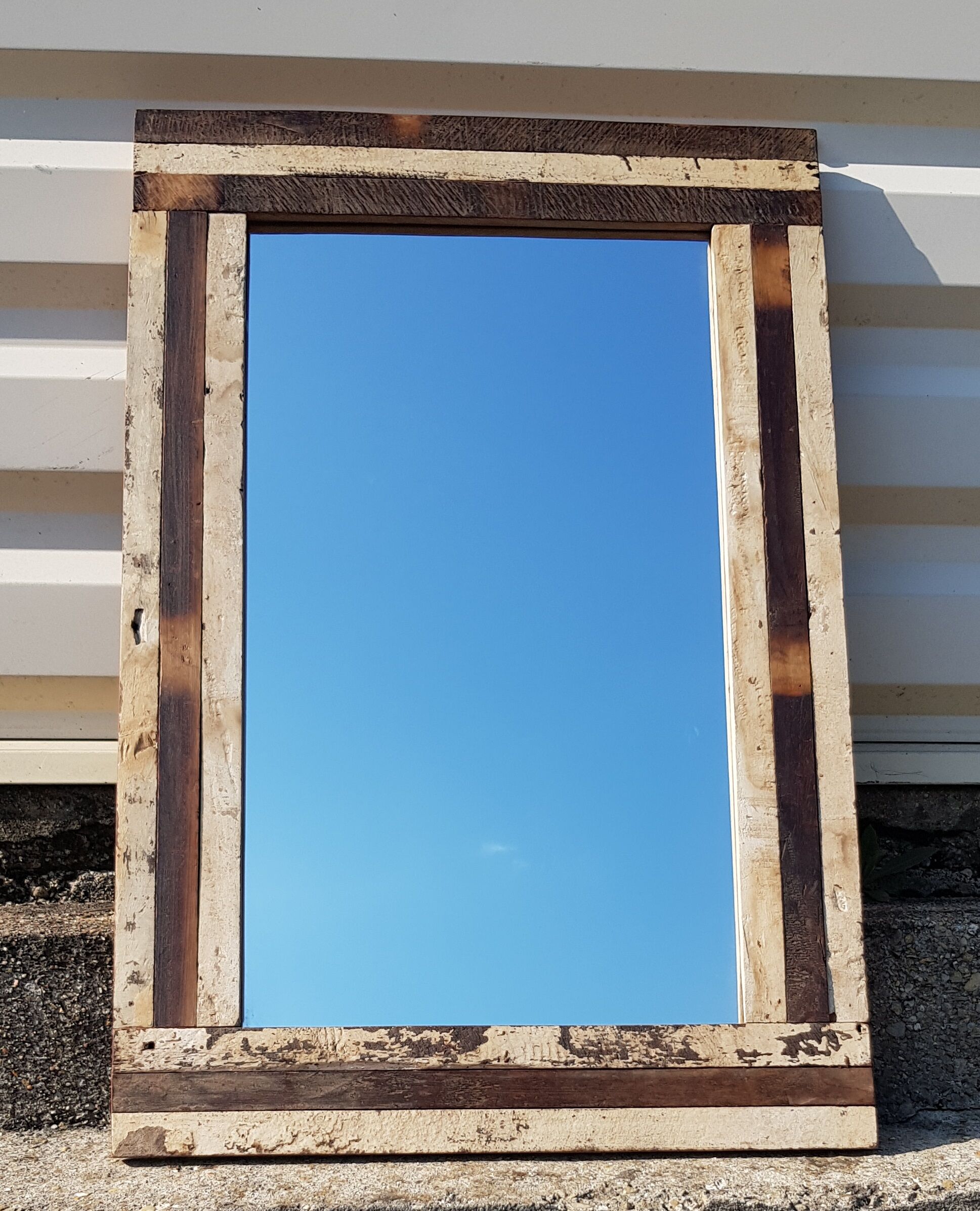Rectangular mirror in polychrome wood