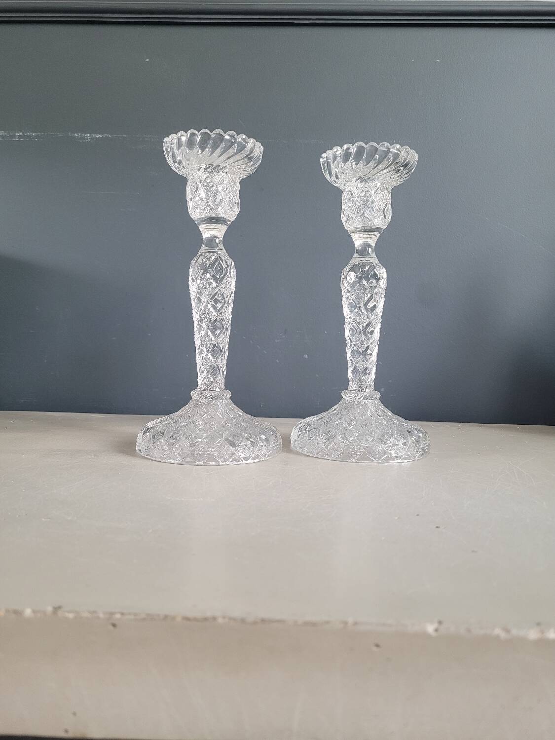 Pair of antique molded glass candlesticks