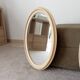Miroir ovale vintage en bois patiné