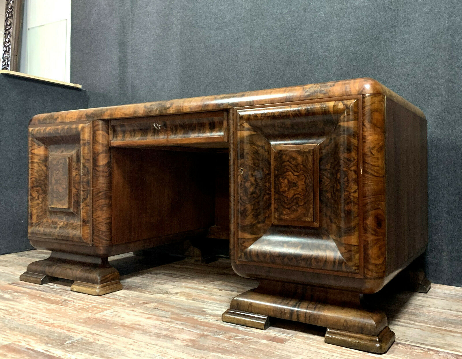 Art deco period office in walnut bramble and amboine magnifying glass