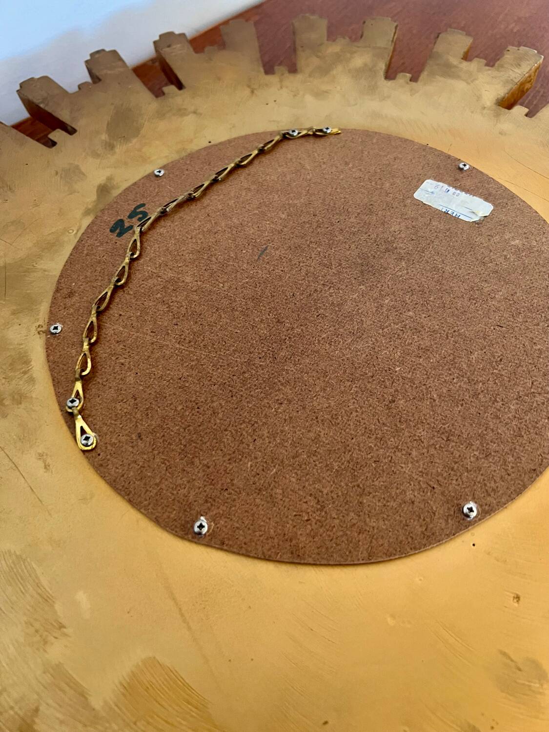 Old large golden sun mirror with rounded witch's eye in vintage resin from the 70s