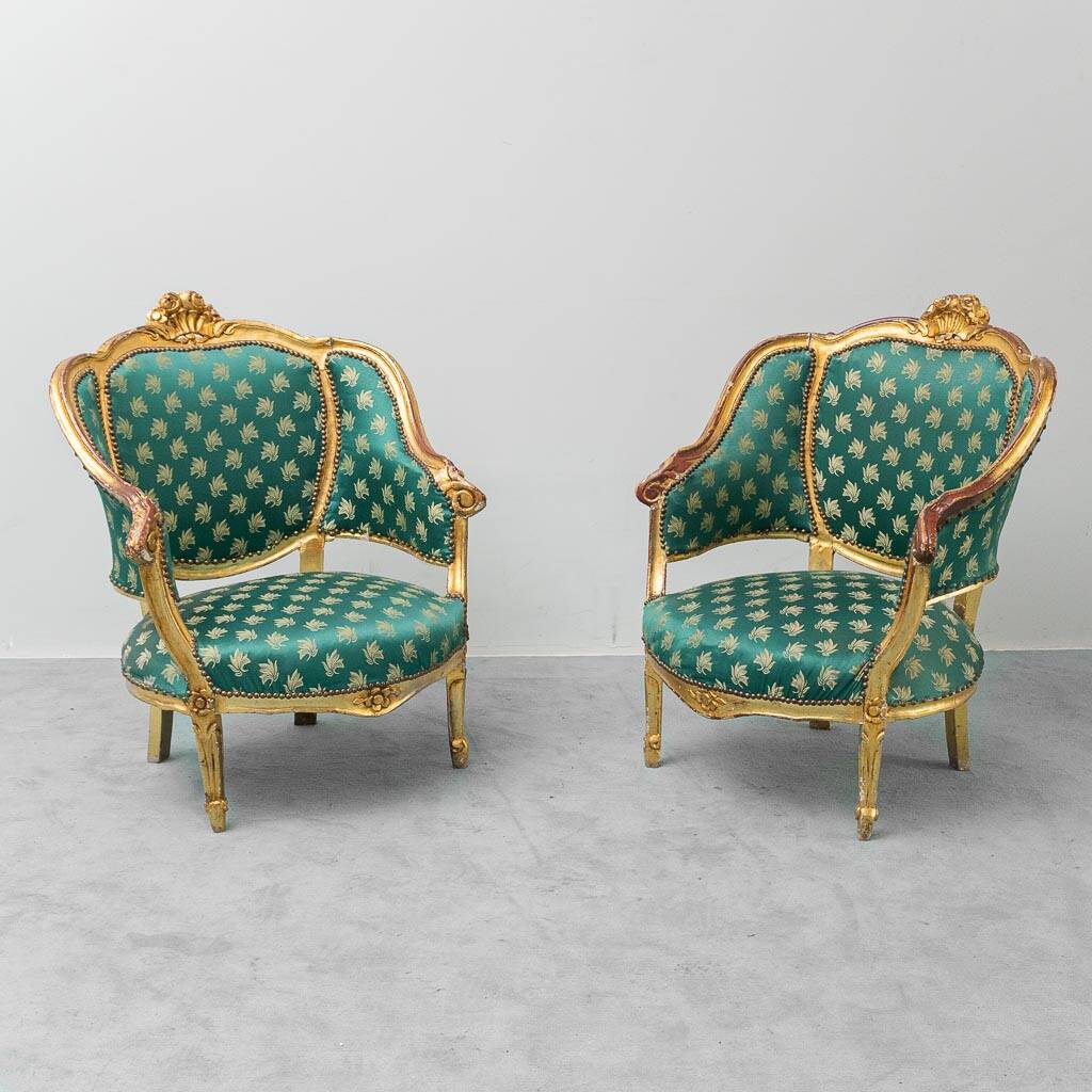 Pair of Louis XV style gilded armchairs with vintage green fabric