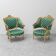 Pair of Louis XV style gilded armchairs with vintage green fabric