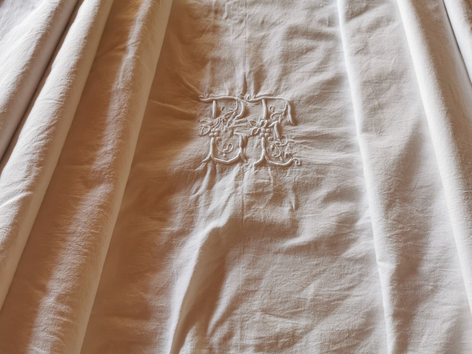 Antique monogrammed fabric