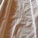 Antique monogrammed fabric