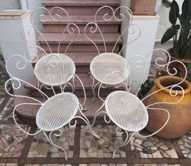 2 armchairs & 2 chairs, wrought iron1950