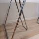 Smoked glass desk on tubular chrome trestles, 1970s design.