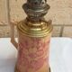 Oil lamp with ceramic body handle