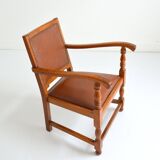Ancien fauteuil en chêne et vinyle brutaliste