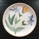 Set plate and jug with floral decoration.
