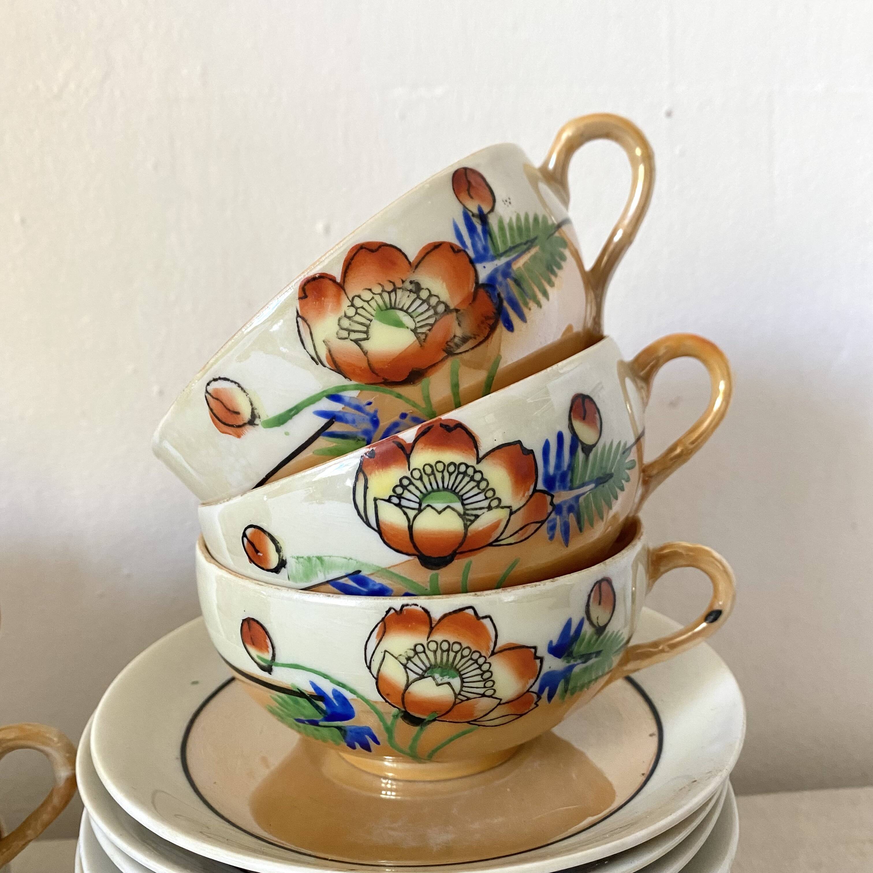 Fine mother-of-pearl and floral porcelain cups, Japan