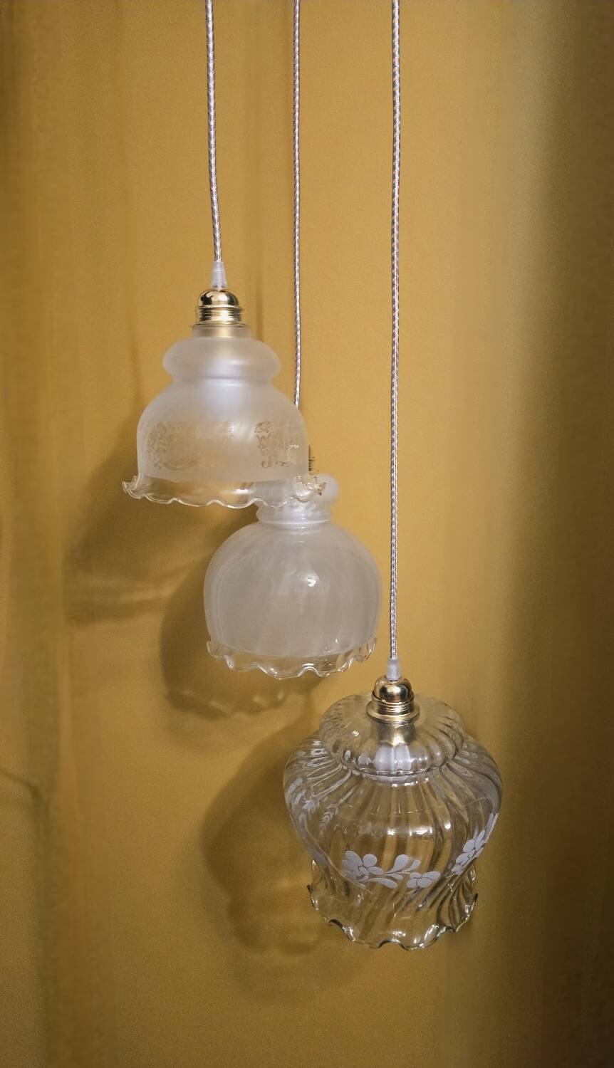 Original suspension of three vintage transparent glass globes.