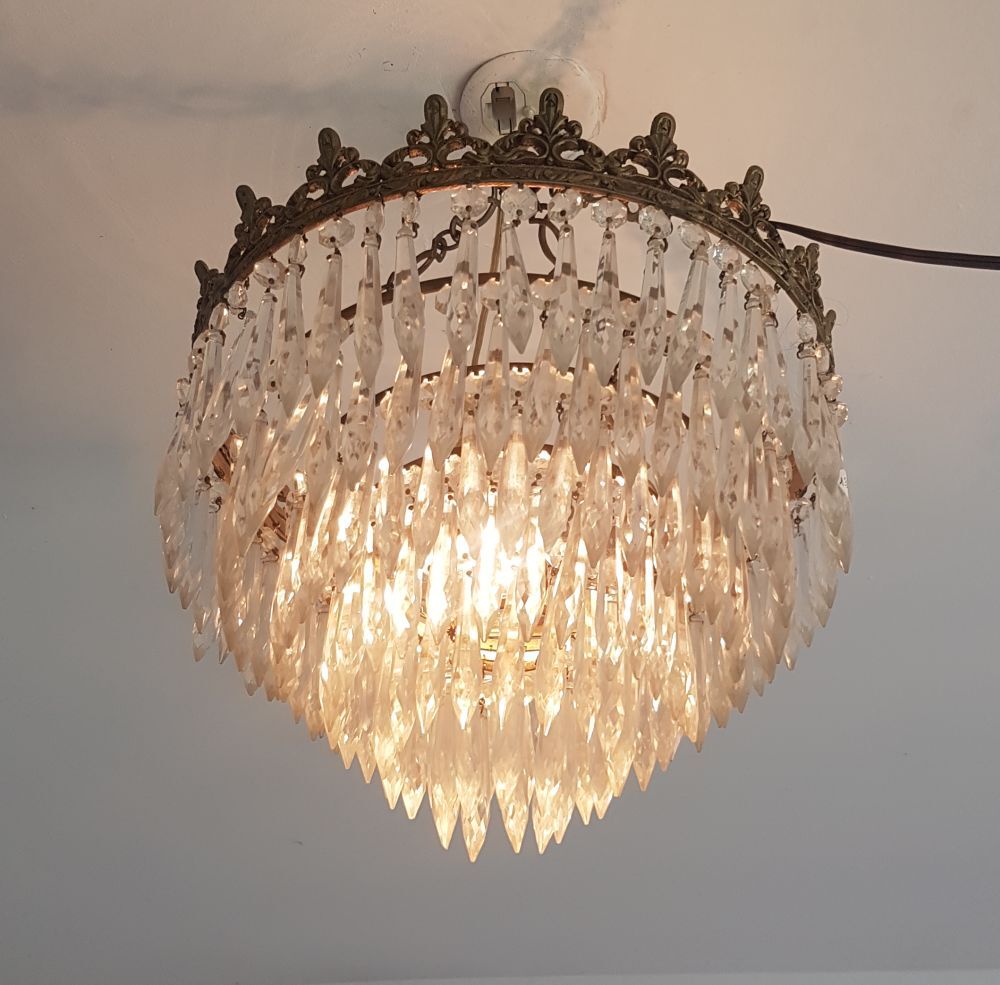 Old chandelier with stamps