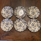 6 antique flat plates in earthenware with blue flower decoration.