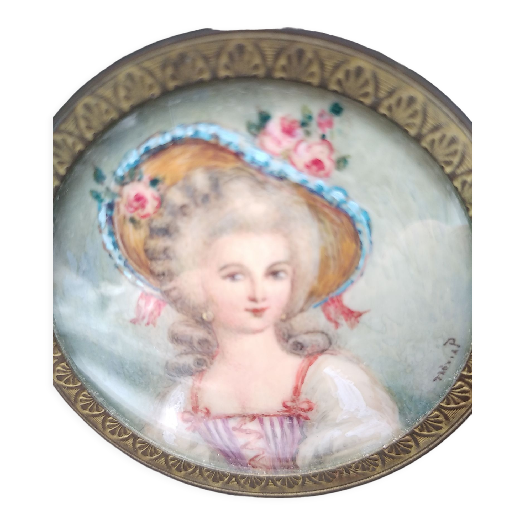 Miniature on ivory. Young woman with a flowery hat