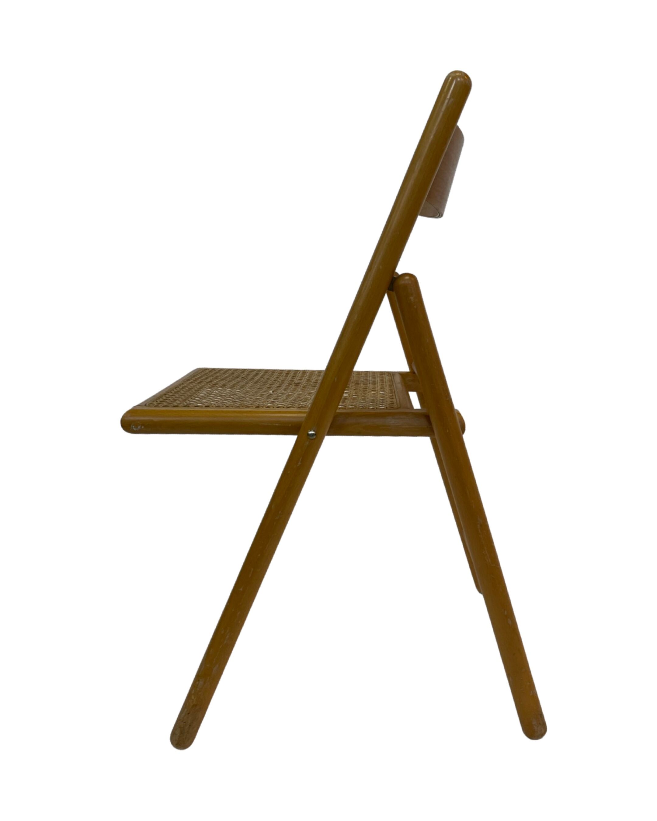 Set of four vintage folding chairs with webbing and wood 1970s