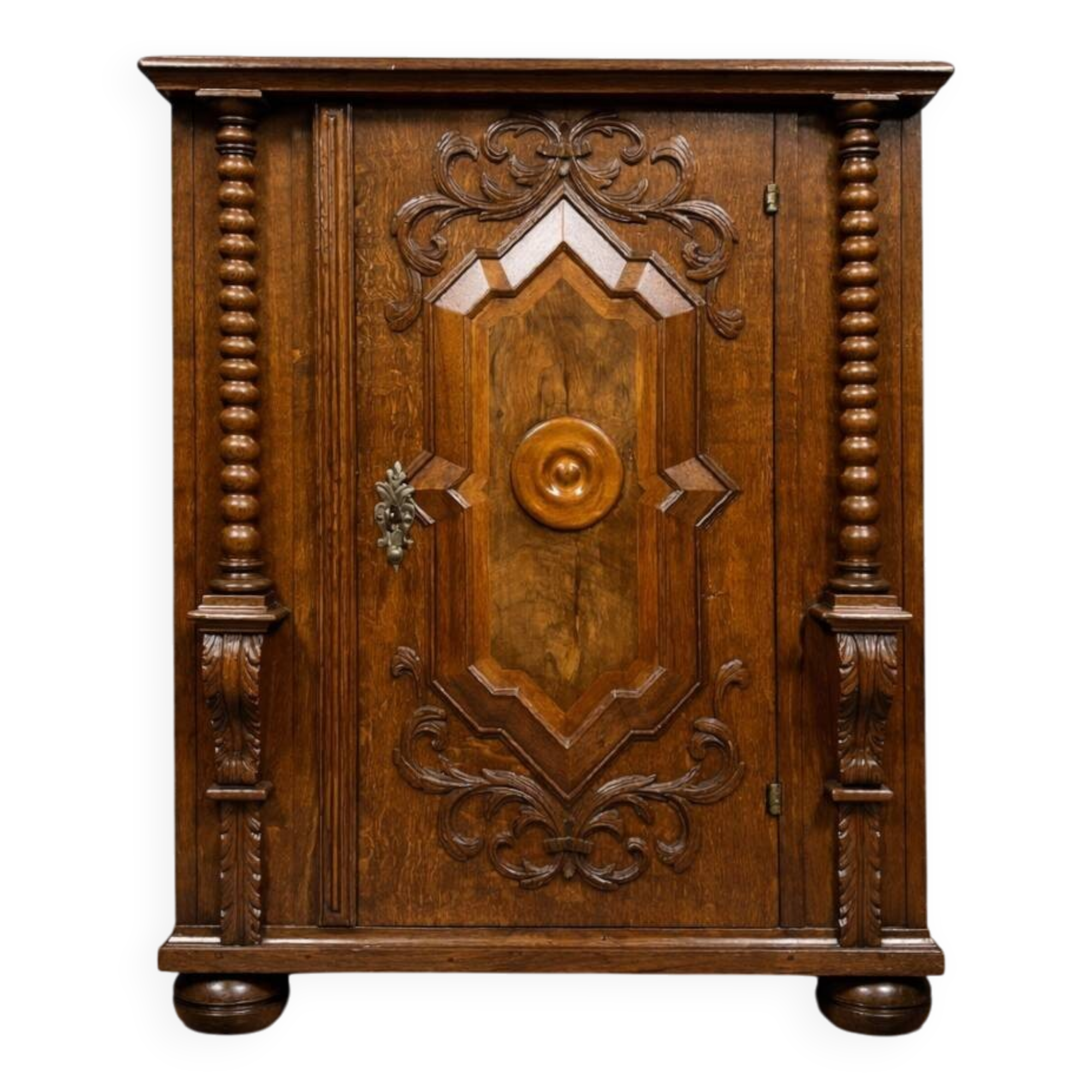 Ornamental piece of solid wood furniture, richly carved, dating from the 17th century.