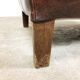 Paire de fauteuils à ailes en cuir de mouton brun foncé vintage