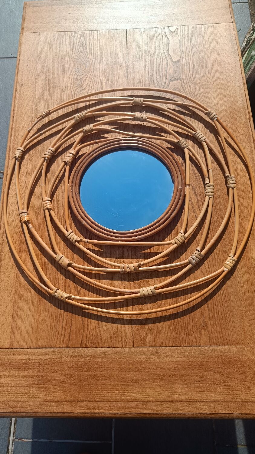 Round rattan mirror