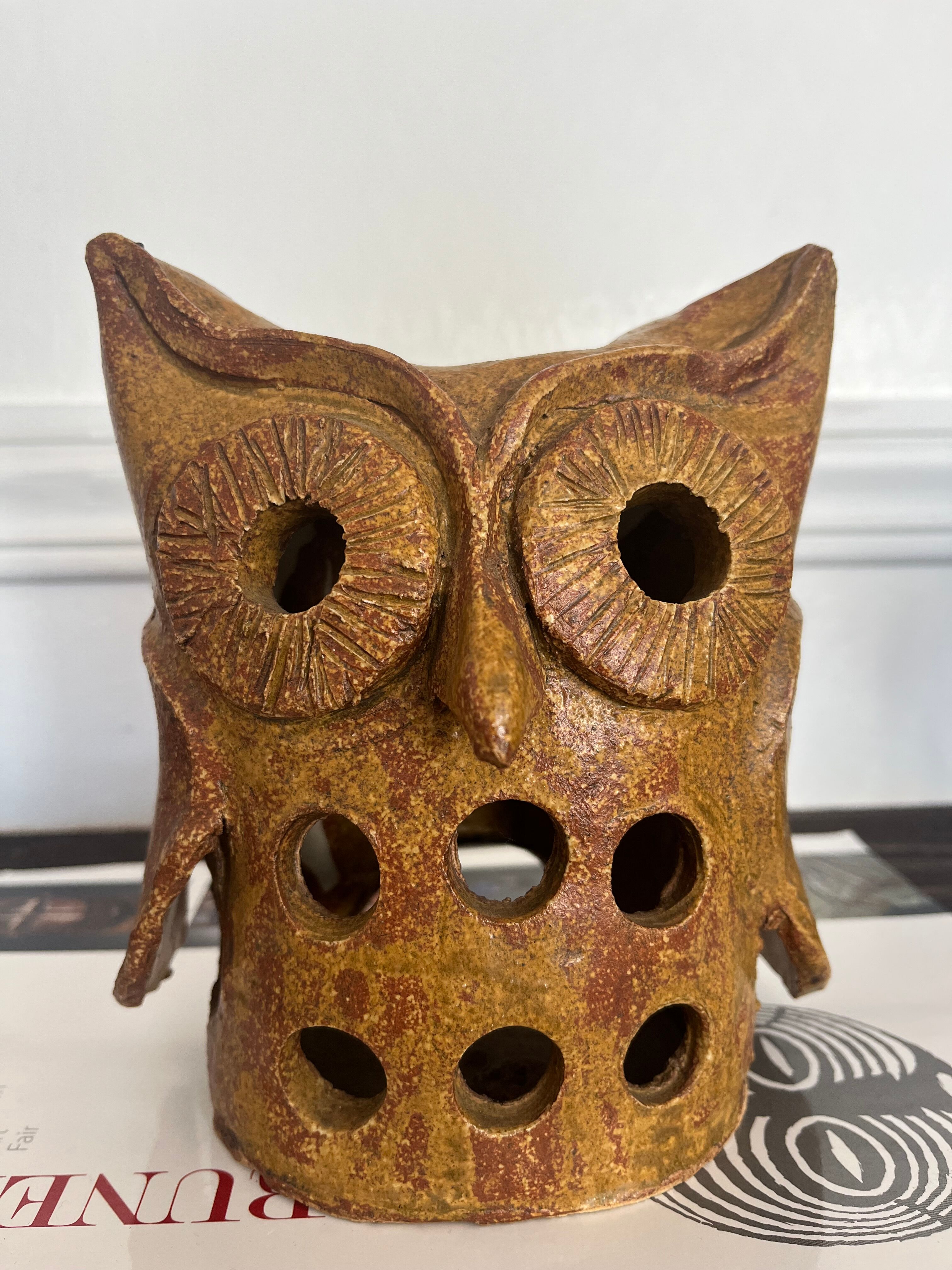 Stoneware lantern in the shape of an owl.