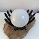 Sculpted ceramic globe lamp.