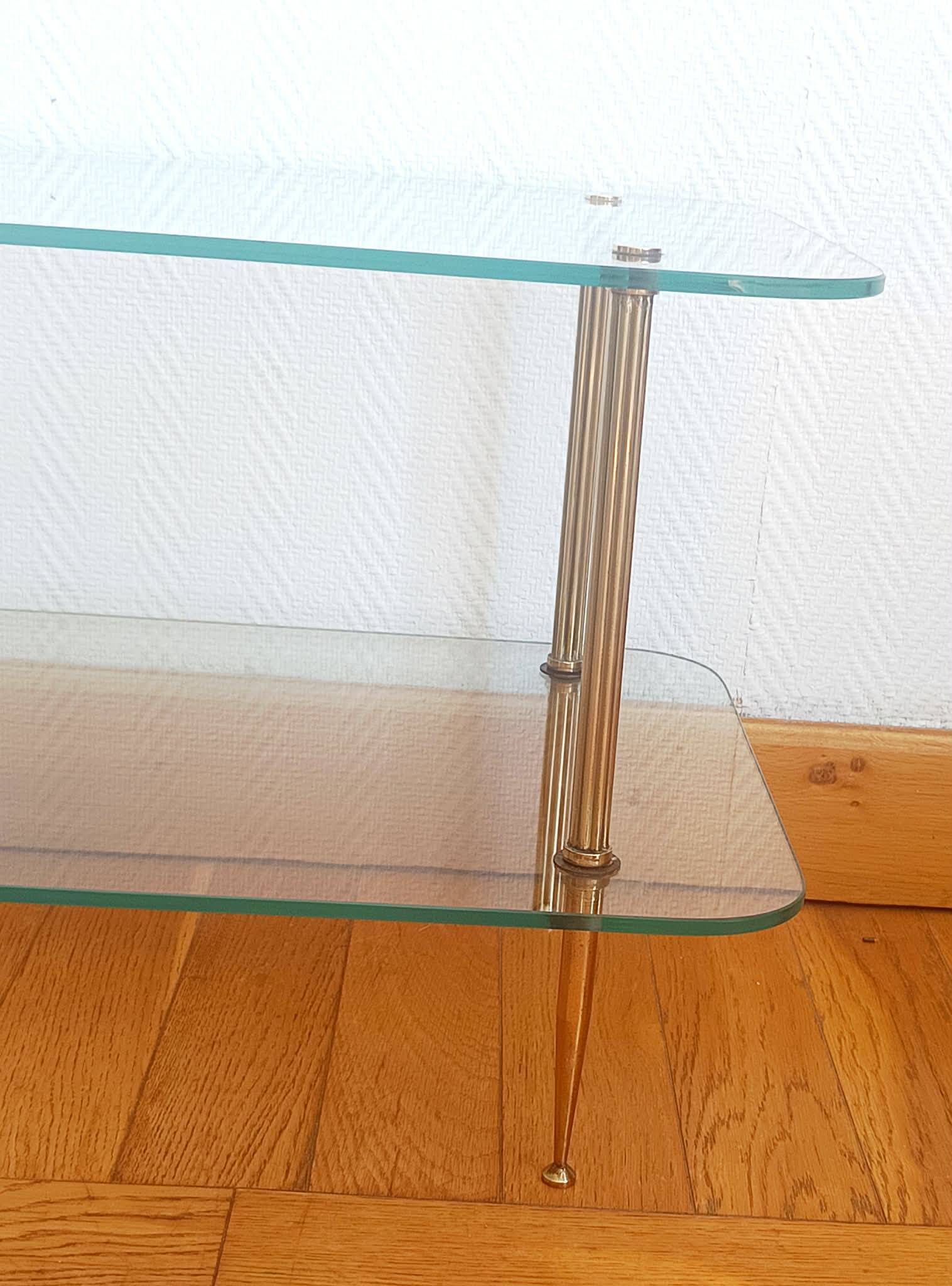 Brass and glass coffee table in Jansen style circa 1960.