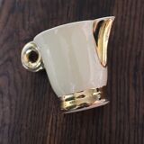Ecru ceramic milk jug with gold decoration from Sarreguemines.