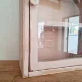 Medicine cabinet in patinated pink wood