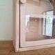 Medicine cabinet in patinated pink wood