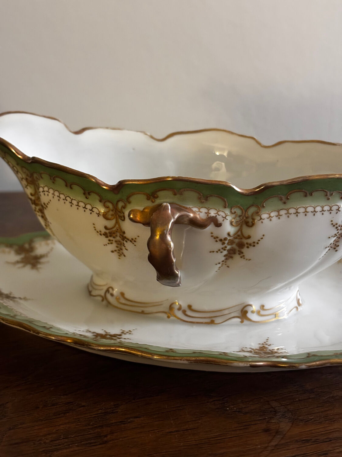 Vintage green Limoges porcelain gravy boat with gilt trim