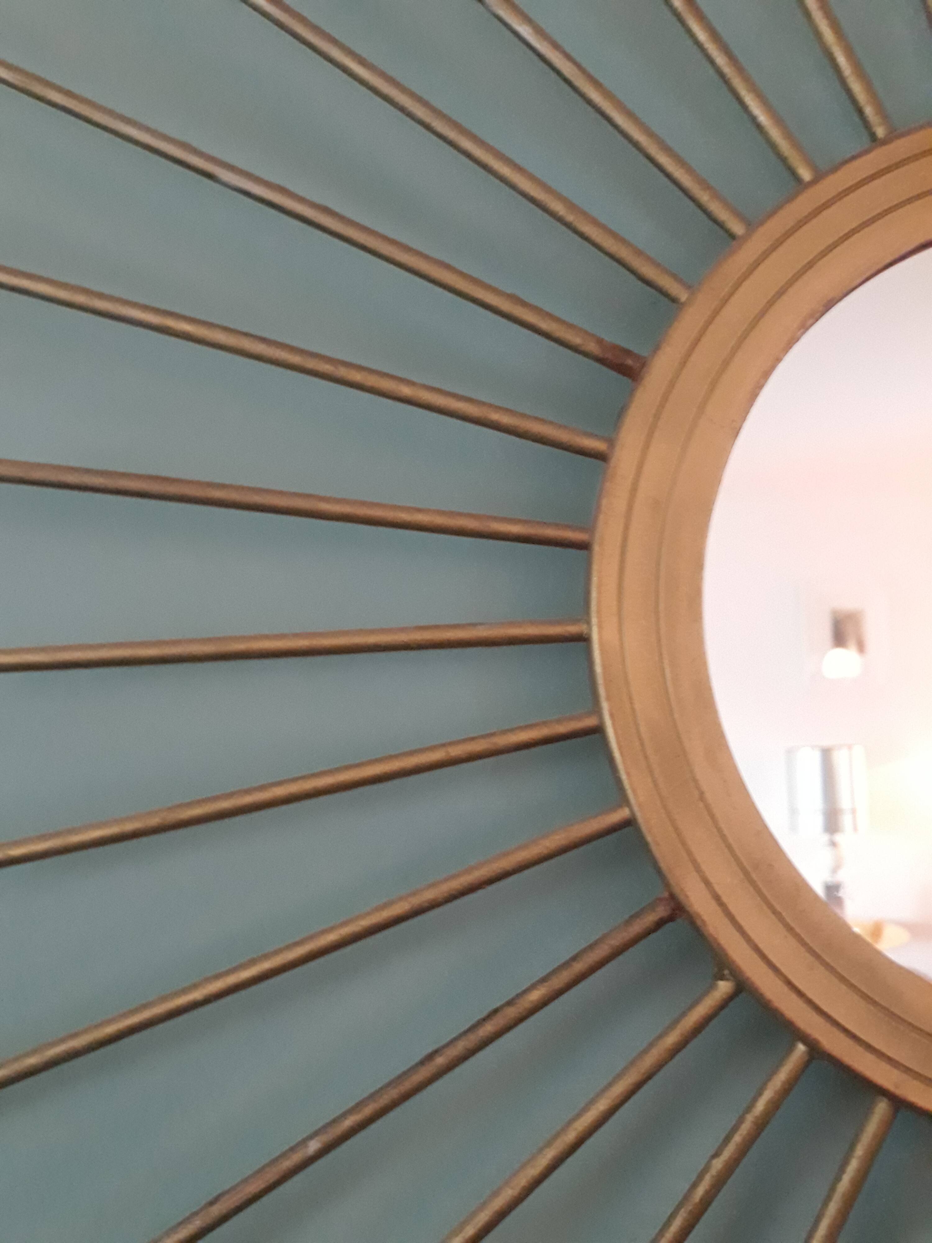 Vintage gold metal sun mirror