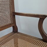 Antique Louis XVI style armchair in wood and caning