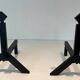 Pair of Modernist Black Iron Andirons with Diamond Finials and Angled Bases