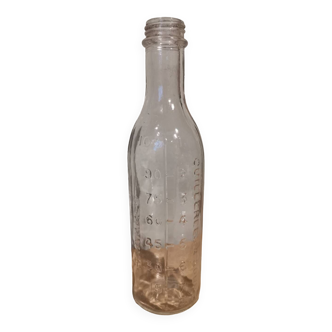 Vintage molded glass graduated apothecary pharmacy bottle