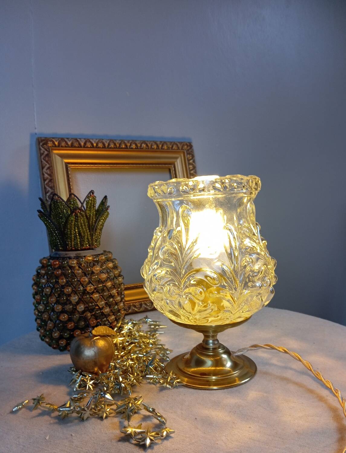 Brass foot table lamp, transparent textured molded globe, art deco style