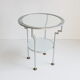 Postmodern round glass  and steel side table, 1980s.
