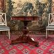 Gueridon in mahogany flame of the 19th century restoration