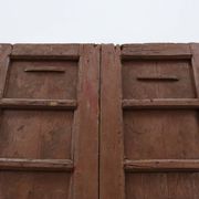 Large 17th century Monastery doors in terracotta lacquered oak, Portugal
