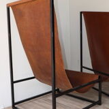 Pair of vintage armchairs in stretched leather and metal structure