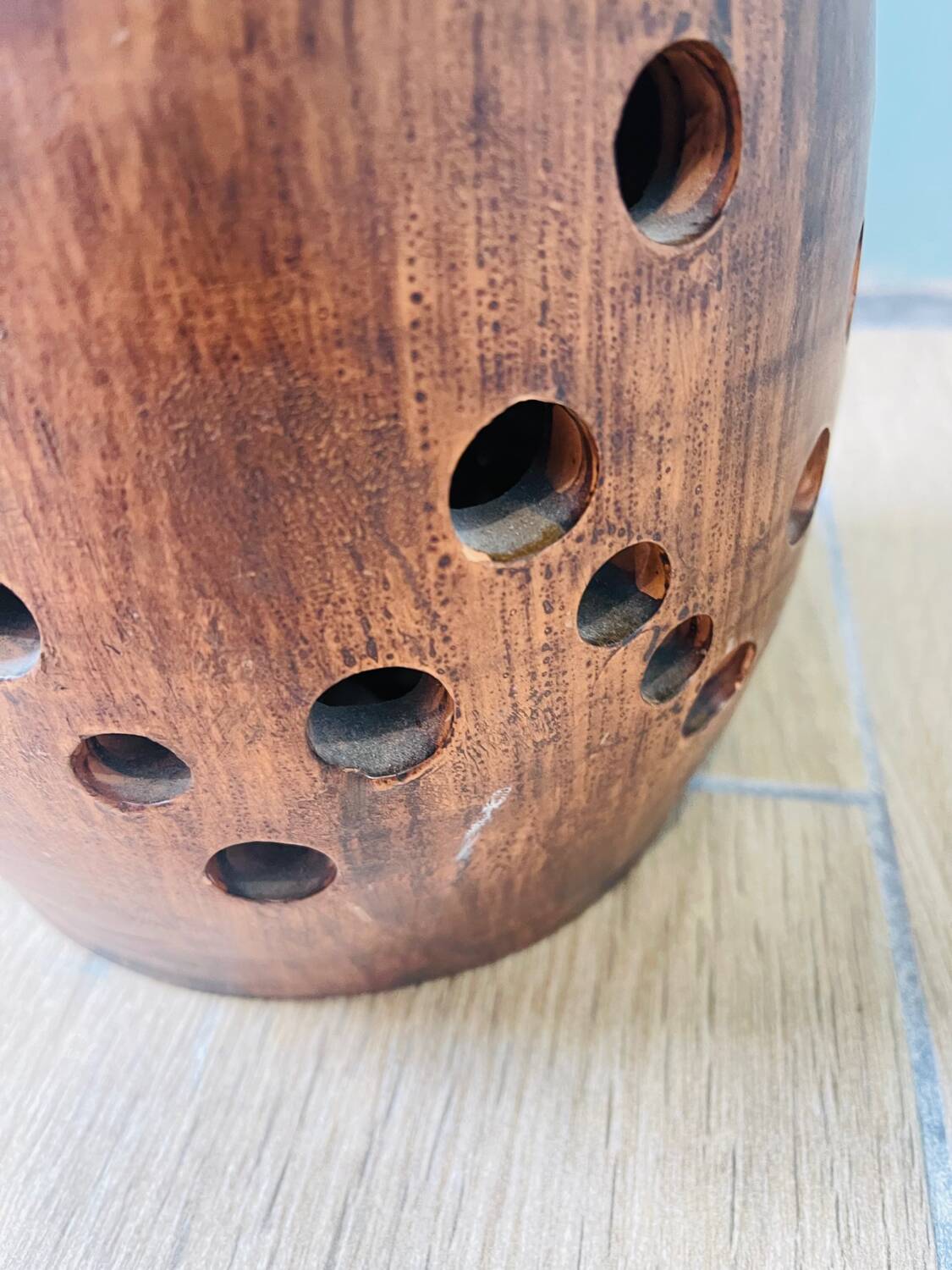 Terracotta lamp with cut-outs, circa 1970.